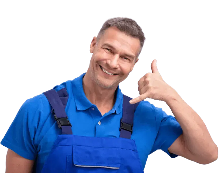A man in overalls giving the thumbs up sign.