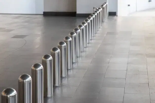 stainless steel bollards on ground floor parking lot