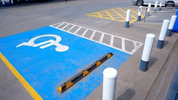 wheel stop installed on a parking lot