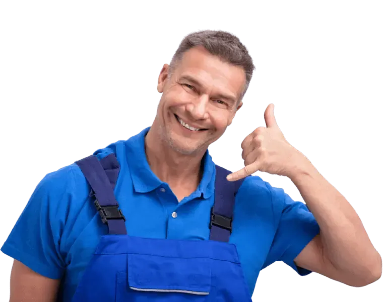 A man in overalls giving the thumbs up sign.