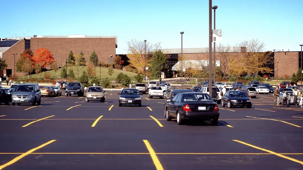 Cars parked in a parking lot.