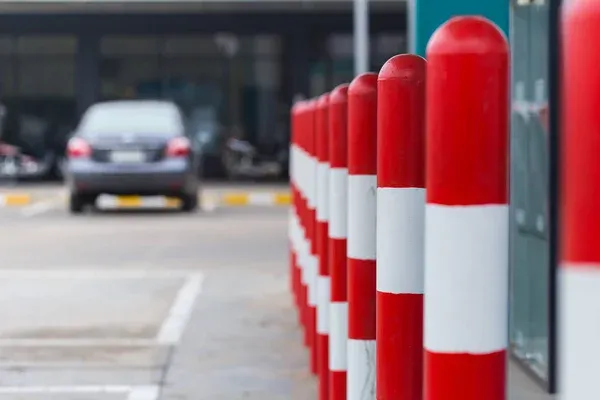 stripe bollard on parking lot